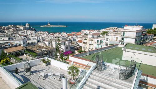 a view of the city from the roof of a building at Quintessenza - Charme Rooms in Vieste