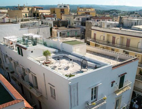 an aerial view of a city with buildings at Quintessenza - Charme Rooms in Vieste