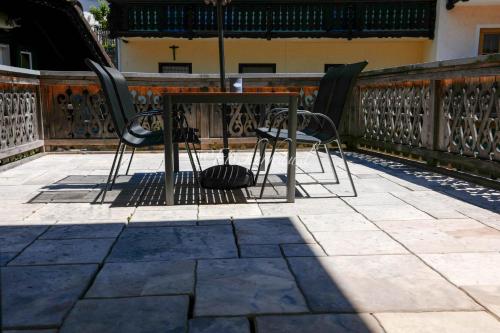 Un balcón o terraza en Fischerhaus Sankt Wolfgang Appartement 1