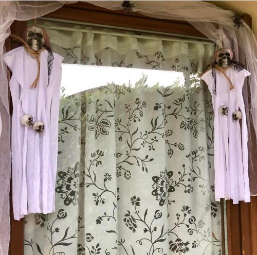 a window with a curtain with aooky at Galleno house in Galleno