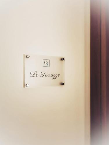 a sign on a door with the words be courage at Alter Ego in Lascari