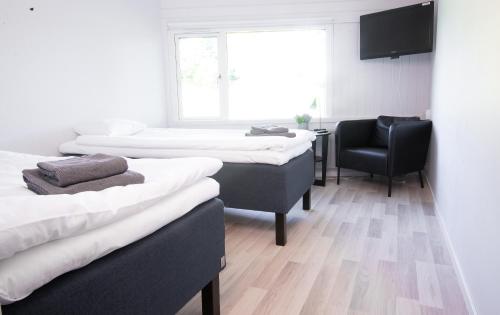 Cama o camas de una habitación en Karlskoga Folkhögskola Vandrarhem Udden