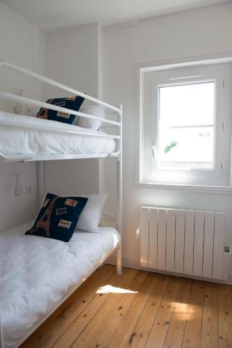 Llit o llits en una habitació de Villa Clarisse
