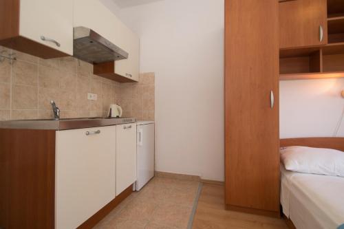 Kuchyňa alebo kuchynka v ubytovaní Vita Apartments