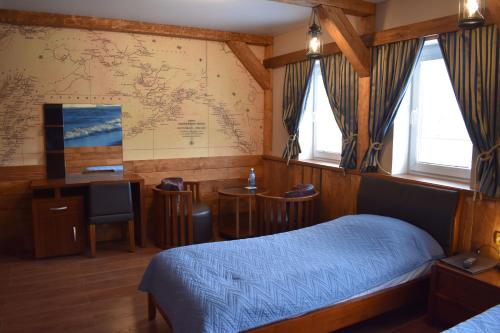 Krevet ili kreveti u jedinici u objektu Nachalnik Kamchatki Hotel