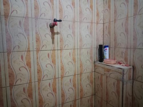 Ett badrum på Amora Homestay