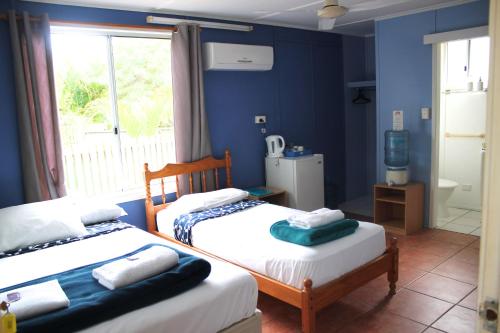 
A bed or beds in a room at Great Keppel Island Hideaway
