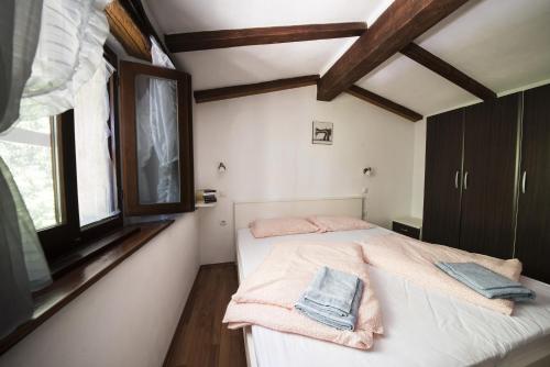 Postel nebo postele na pokoji v ubytování Holiday Home Cosseriga