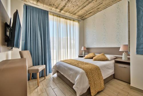 Postel nebo postele na pokoji v ubytování Cozy Rooms Hotel