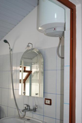 Ένα μπάνιο στο Apartments Hotel AL&DE