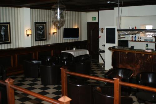 The lounge or bar area at Hotel Vinhuset
