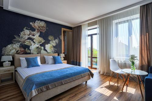 Postel nebo postele na pokoji v ubytování Redling Hotel