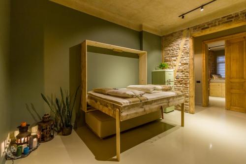 a bedroom with a bunk bed in a room at Nomad in Cluj-Napoca