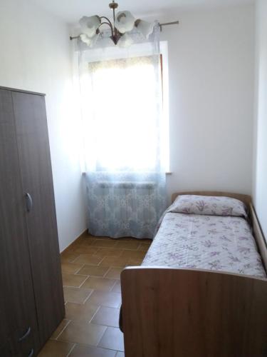 Ein Bett oder Betten in einem Zimmer der Unterkunft casa Gaia 2