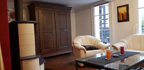 Un lugar para sentarse en Casa Cuschina - mit Sauna in der schönen Surselva