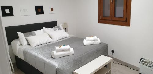 Postel nebo postele na pokoji v ubytování Apartamento Toledo San Justo