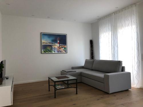 Posezení v ubytování Apartment unter den Weinbergen