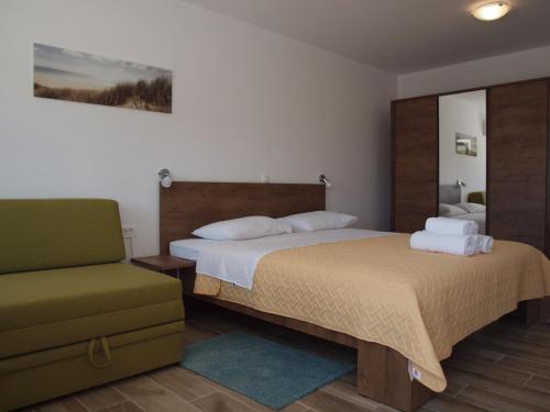 Posteľ alebo postele v izbe v ubytovaní Apartman&Studio S