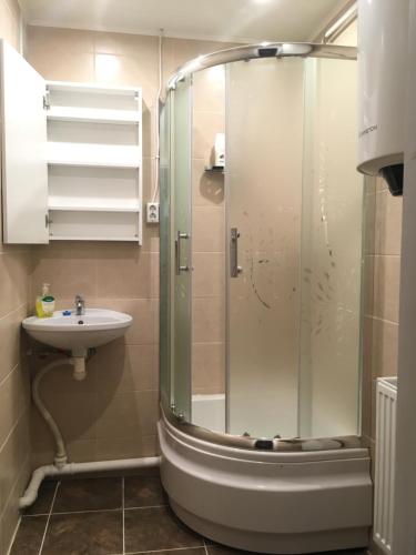 a bathroom with a shower and a sink at Veriora apartment in Veriora