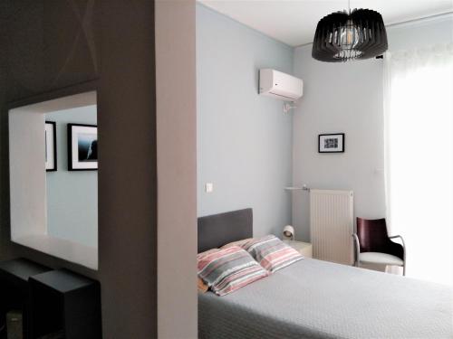 Posteľ alebo postele v izbe v ubytovaní Athens Pangrati modern apt 10min to metro