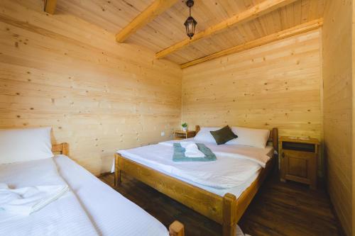 Postel nebo postele na pokoji v ubytování JELA NATURAL RESORT