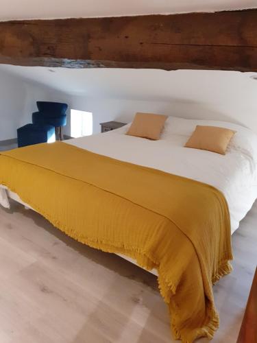 Un pat sau paturi într-o cameră la A Casetta di SANTA MARIA