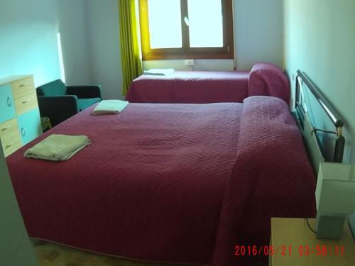 Letto o letti in una camera di The Caponi Bros
