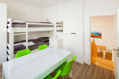 Ένα ή περισσότερα κρεβάτια σε δωμάτιο στο SecondHome Stuttgart - Very nice apartment near historic city centre at Blumenstr 58 in Esslingen am Neckar - W2