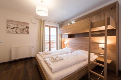 Postel nebo postele na pokoji v ubytování Apartment Bacher
