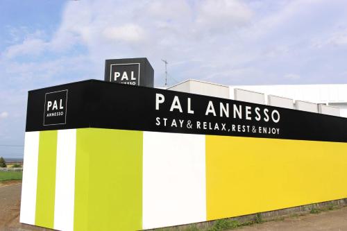 a building with a sign that reads pal amnesia at Hotel Pal Anesso Nakatsu (Love Hotel) in Nakatsu