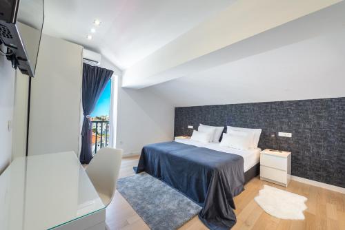 Postel nebo postele na pokoji v ubytování Vista deluxe apartment