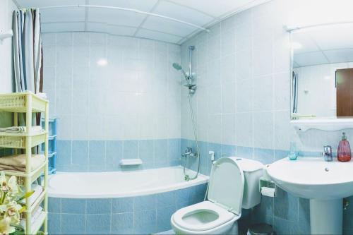 Ένα μπάνιο στο Exclusive Creek Bay Apartment