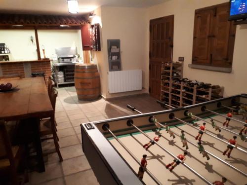 a table with toy soldiers on it in a room at Villa Miranda in Carrascal de Barregas