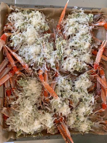 a tray of food with carrots and cheese at Hem till Bengt in Kungshamn