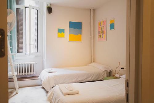 Postel nebo postele na pokoji v ubytování A Room In The City Hostel