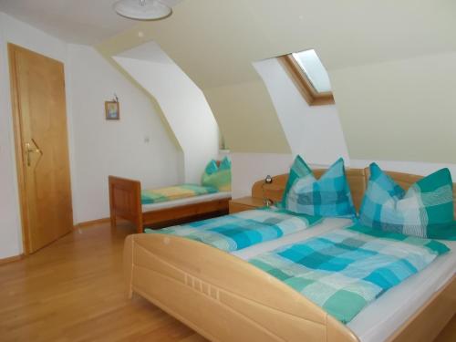 Postel nebo postele na pokoji v ubytování Biohof Mayerhofer