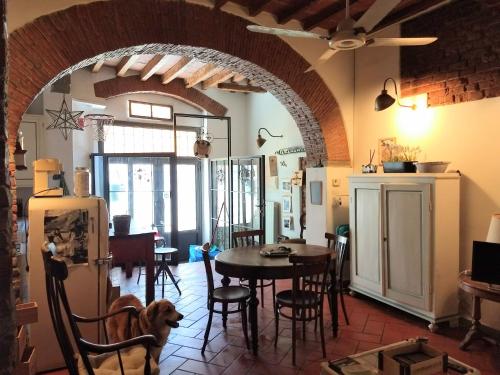 a kitchen and dining room with a table and chairs at Real Taste of Tuscany in Florence