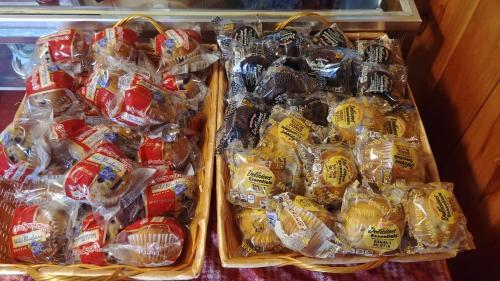 two trays of food in plastic bags on a table at Falls Motel in International Falls