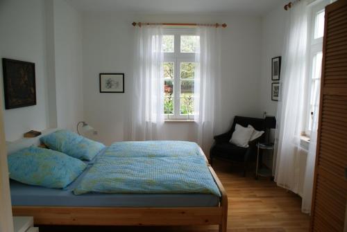 Postelja oz. postelje v sobi nastanitve Altes Landhaus am Park