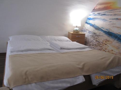 Llit o llits en una habitació de Apartment Agava
