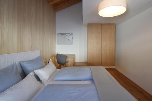 Postel nebo postele na pokoji v ubytování Loft7