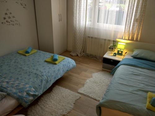 Postel nebo postele na pokoji v ubytování Apartment Stars in Shadow