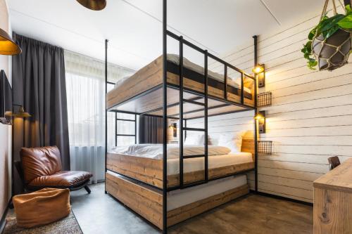 Cama o camas de una habitación en GuestHouse Hotel Kaatsheuvel-Waalwijk