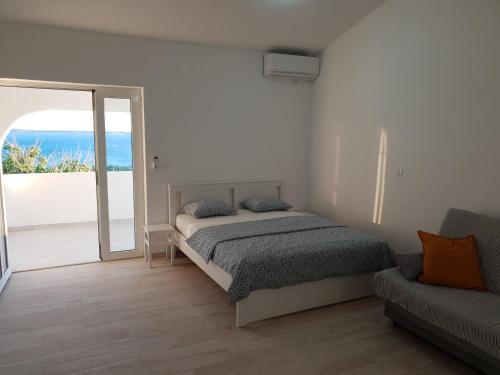 Postel nebo postele na pokoji v ubytování Endless Horizont Apartment