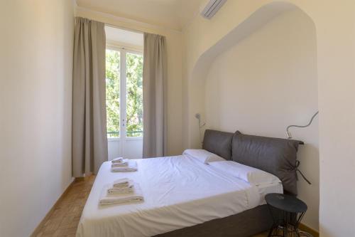 Ein Bett oder Betten in einem Zimmer der Unterkunft Elegance in Santa Maria Novella