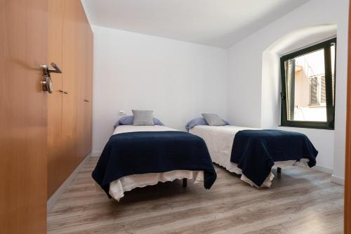 Posteľ alebo postele v izbe v ubytovaní MAISON MOMA