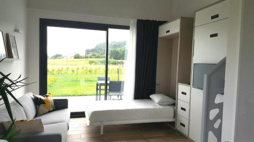 Postel nebo postele na pokoji v ubytování APARTAMENTOS VALLE DE IROLA