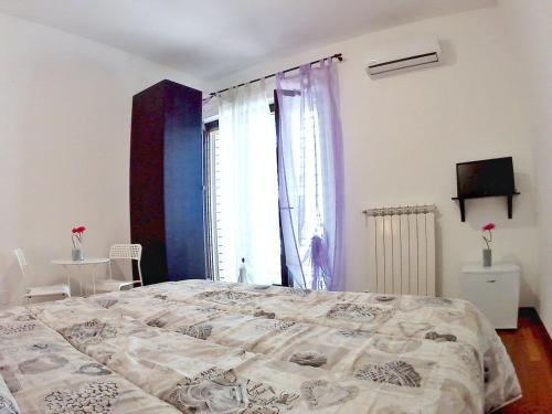 Katil atau katil-katil dalam bilik di B&B Angelina