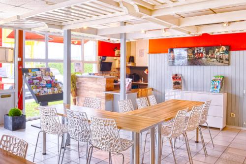 Restaurace v ubytování Brit Hotel Macon Nord Autoroute du Soleil