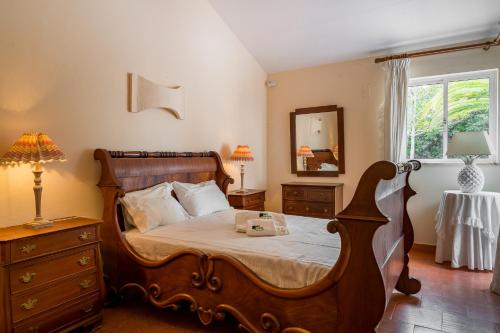 Säng eller sängar i ett rum på BmyGuest - Falésia Beach Villa